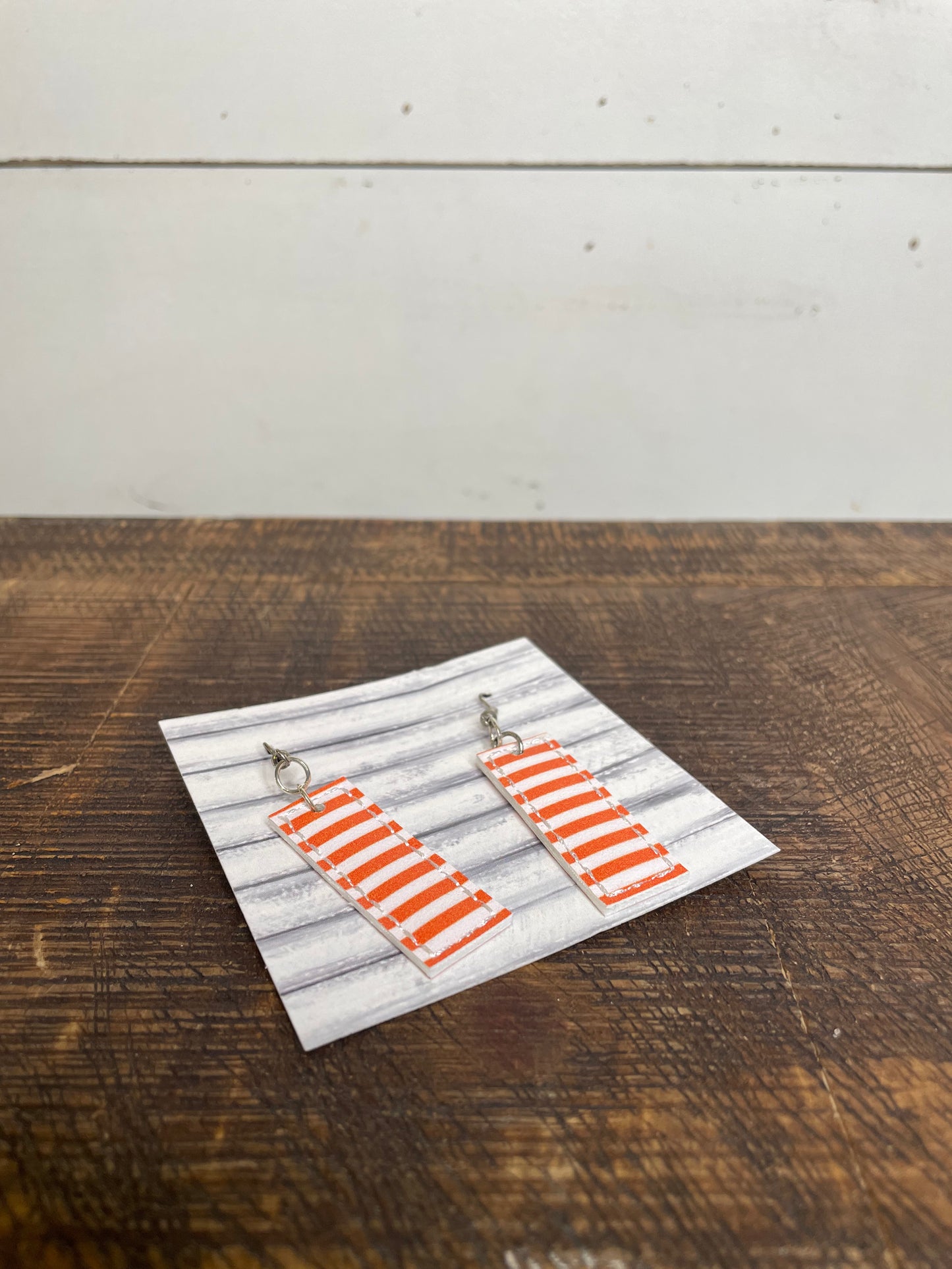 FAUX LEATHER PUMPKIN AND WHITE STRIPE EARRINGS