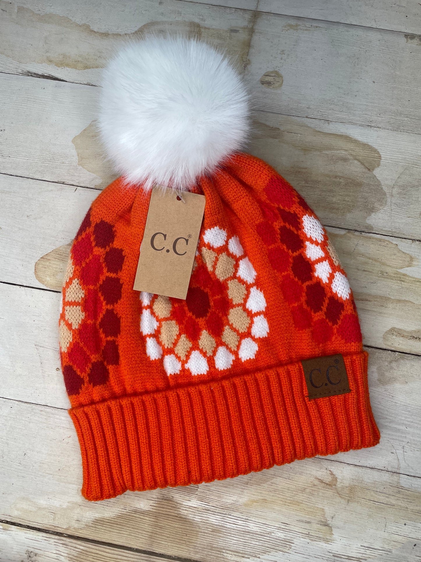 WOMENS ORANGE PRINT WHITE POM BEANIE