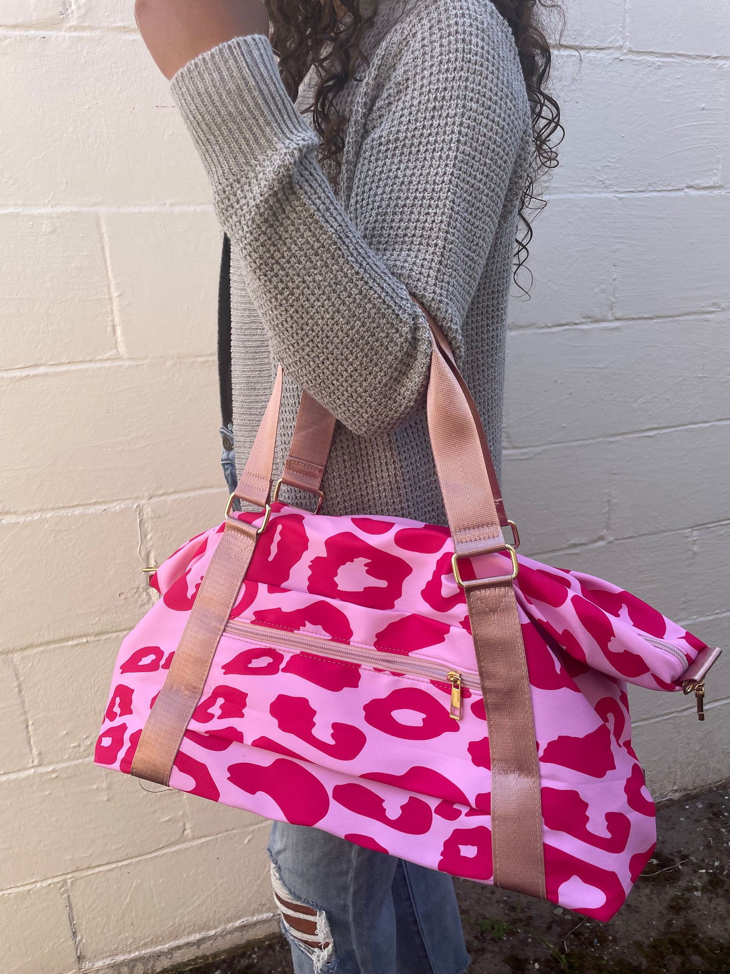 RED ON BABY PINK LEOPARD PRINT DUFFLE