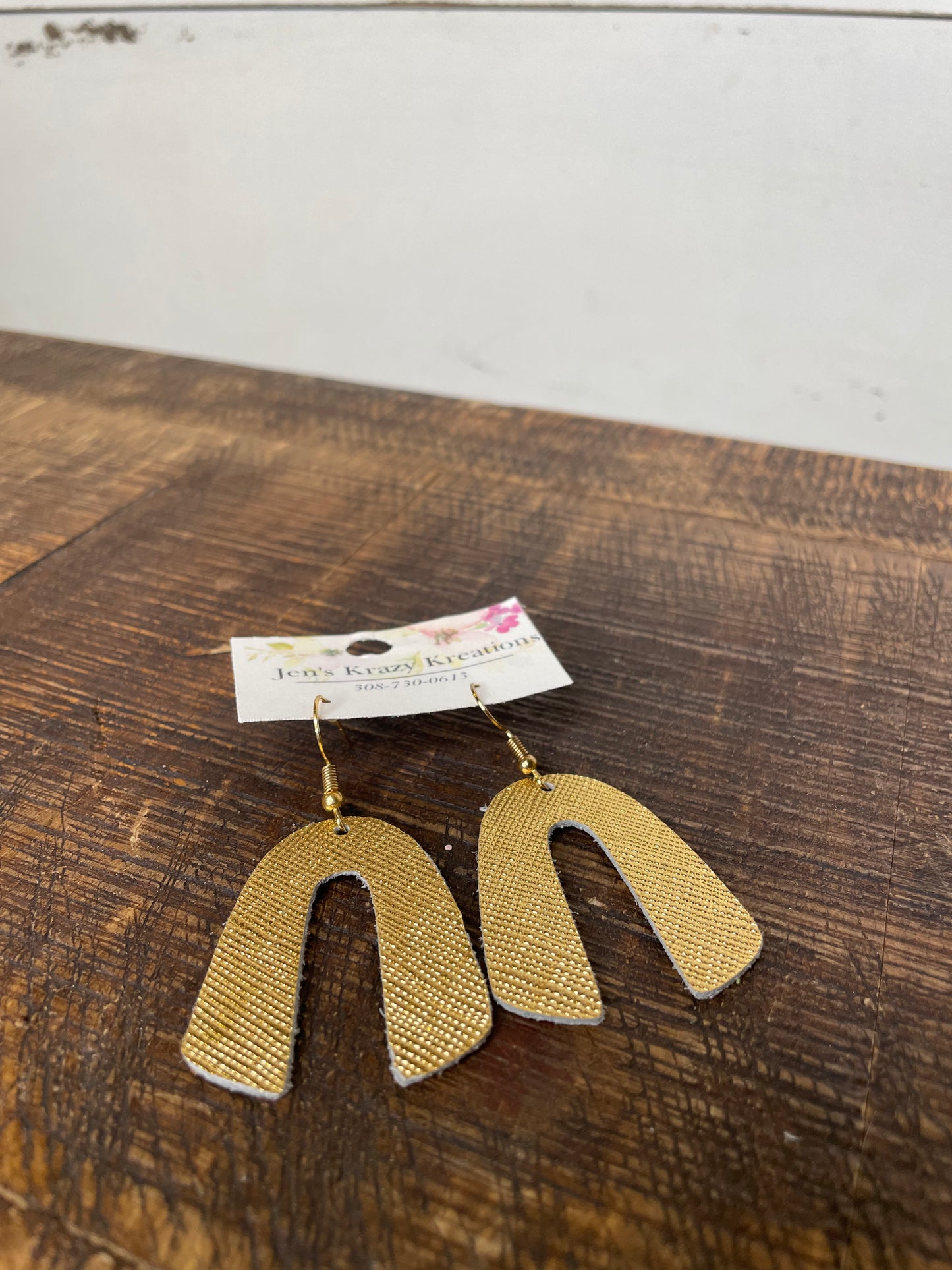 SHINY GOLD ARCH FAUX LEATHER EARRINGS