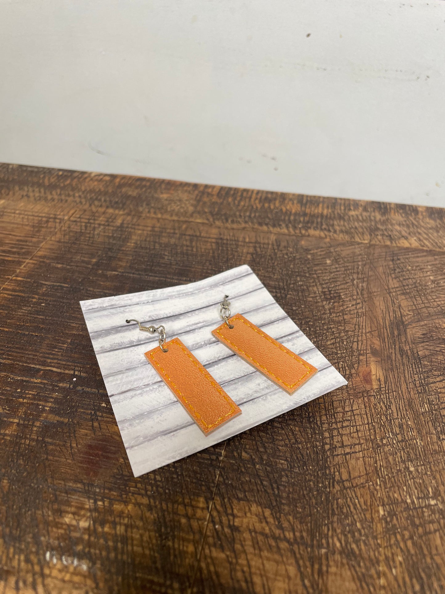FAUX LEATHER SPARKLY ORANGE EARRINGS