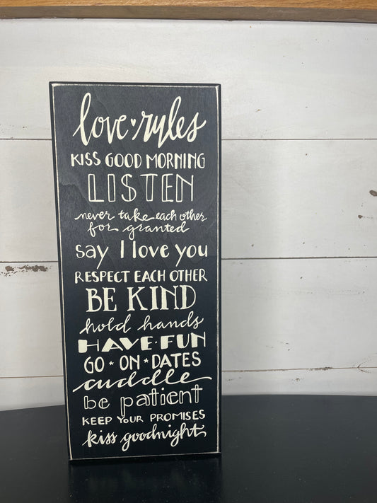 BLACK AND WHITE WOODEN BOX SIGN LOVE RULES